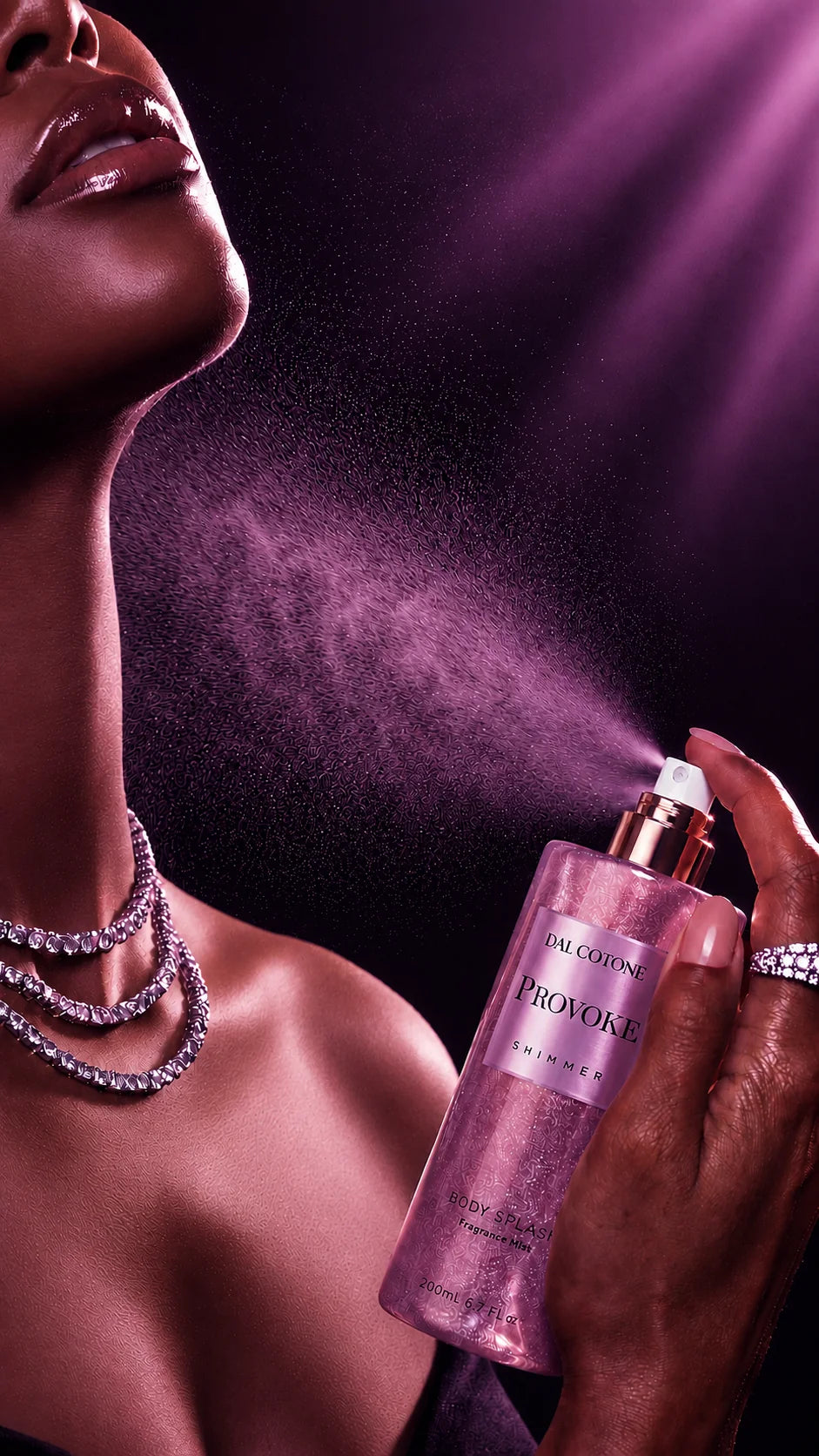 Woman spraying Dal Cotone Provoke Shimmer Body Splash on her neck